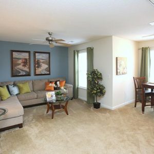 Model unit living room featuring modern furniture