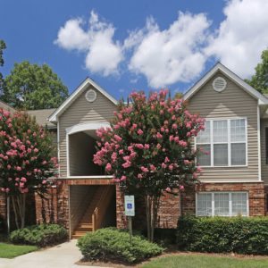 Building Exterior with Crepe Myrtles in Bloom